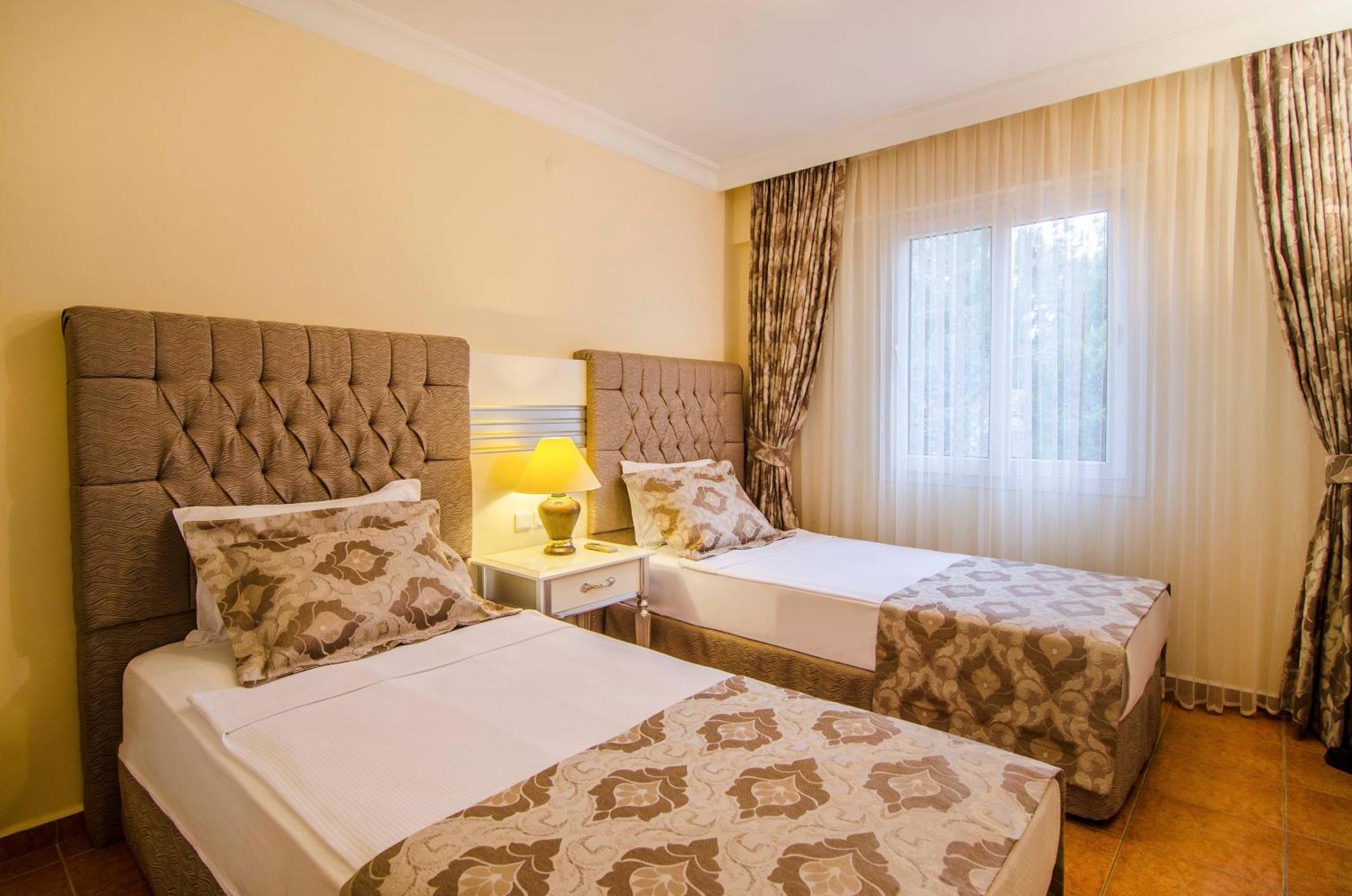 Pine Club Apart Hotel คูซาดาซี ภายนอก รูปภาพ
